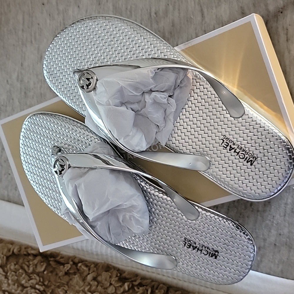 Like new MK silver thong slides